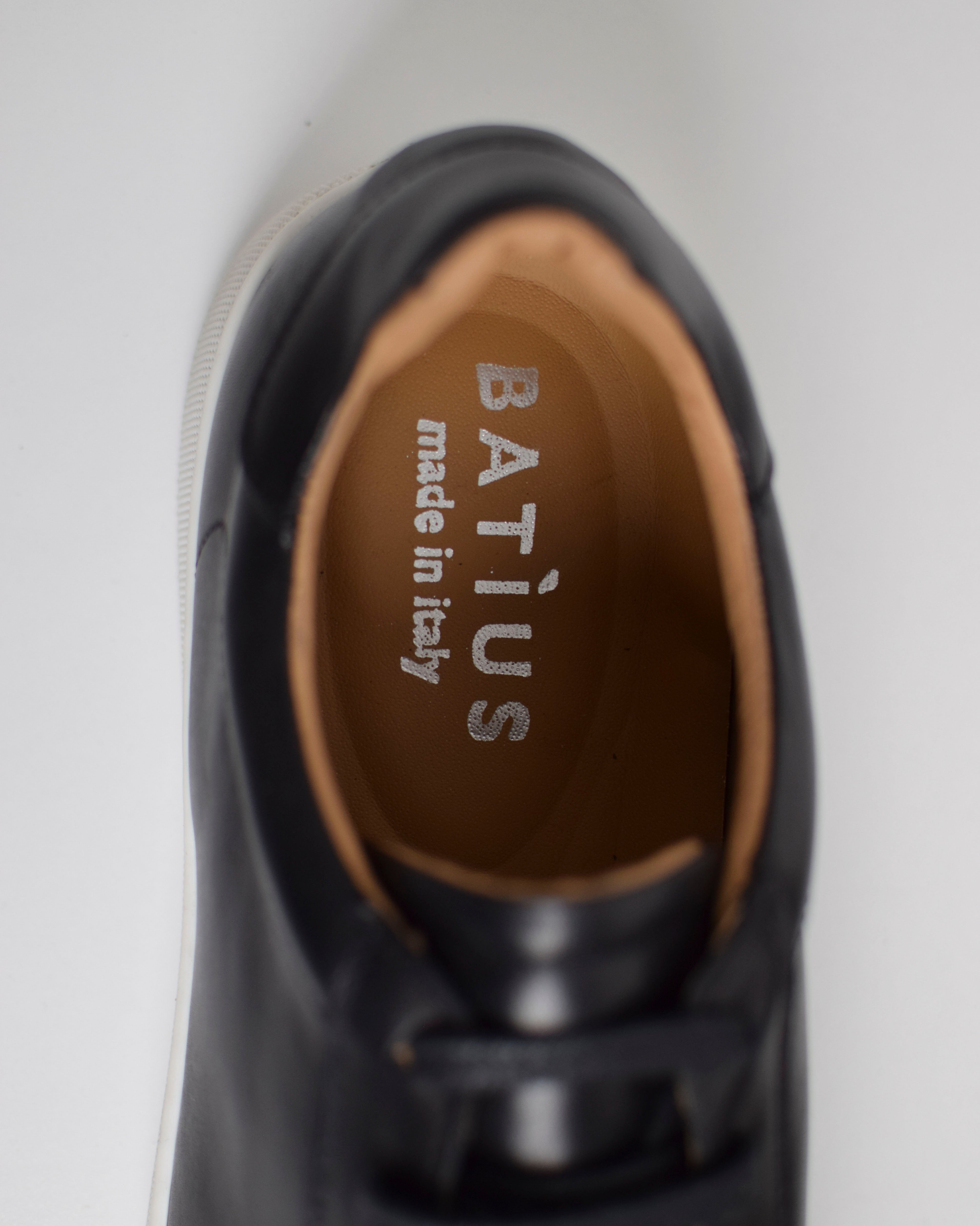 Sneakers in pelle