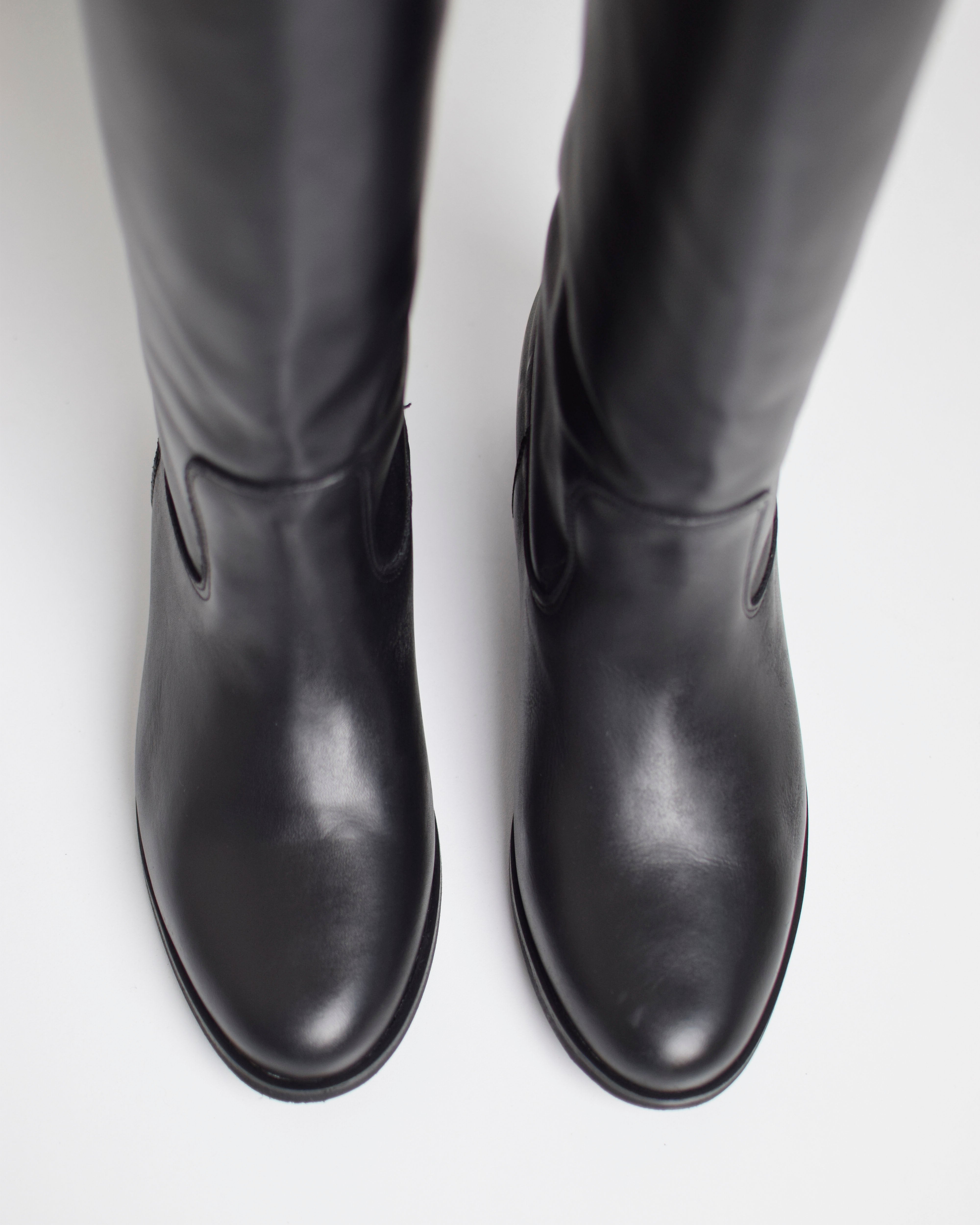 Boot with leather strap