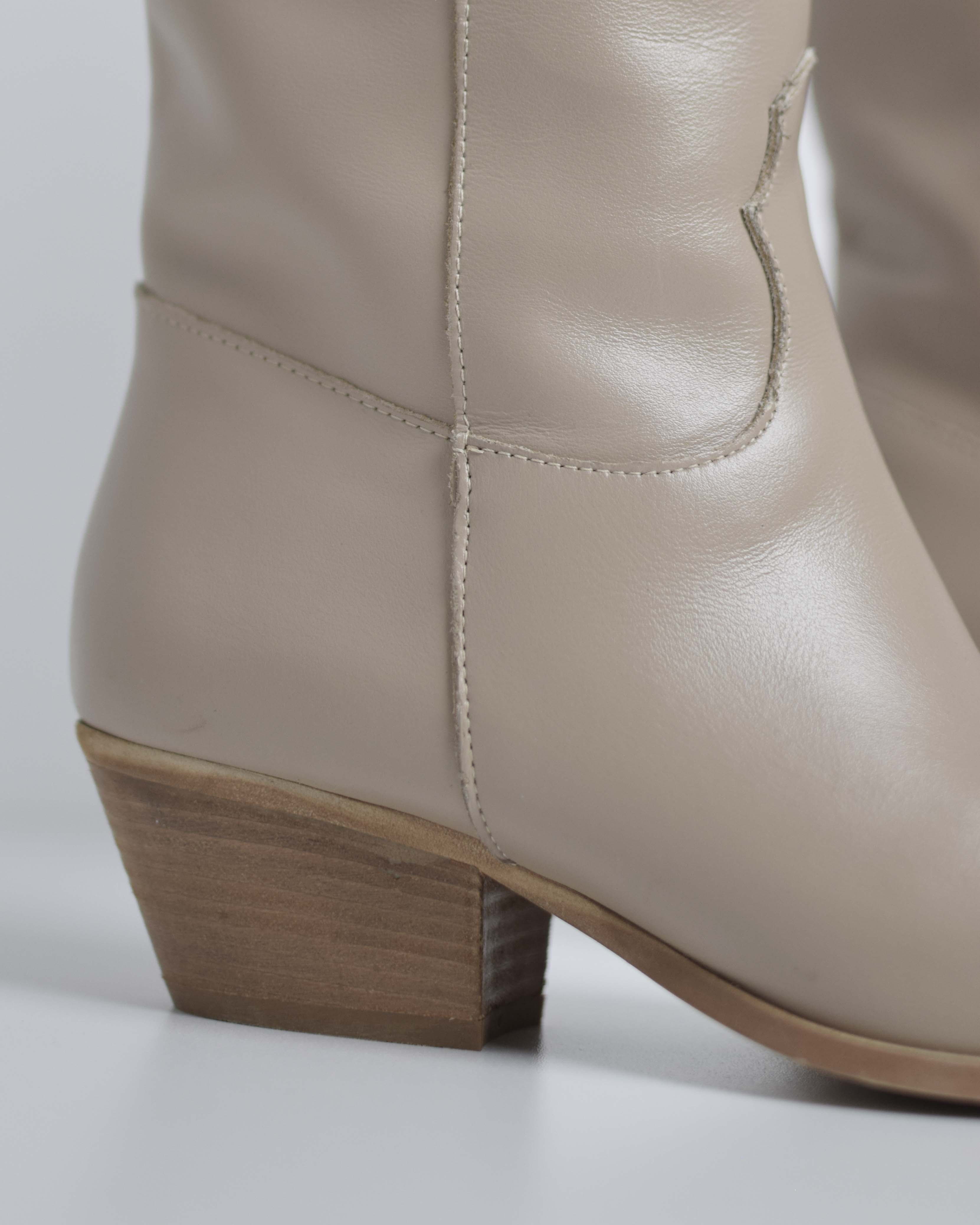 Texani alti in pelle