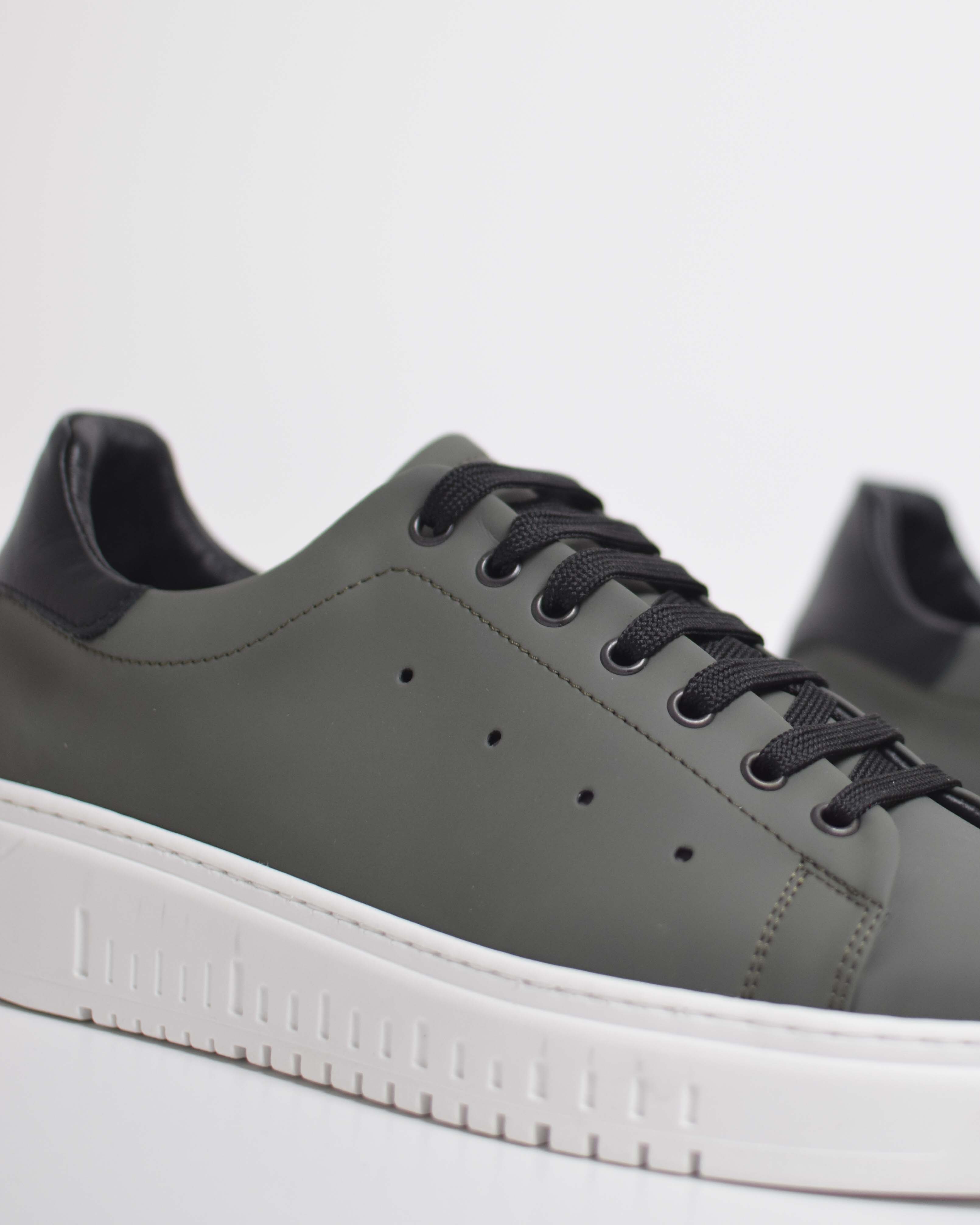 Sneakers in rubberized fabric