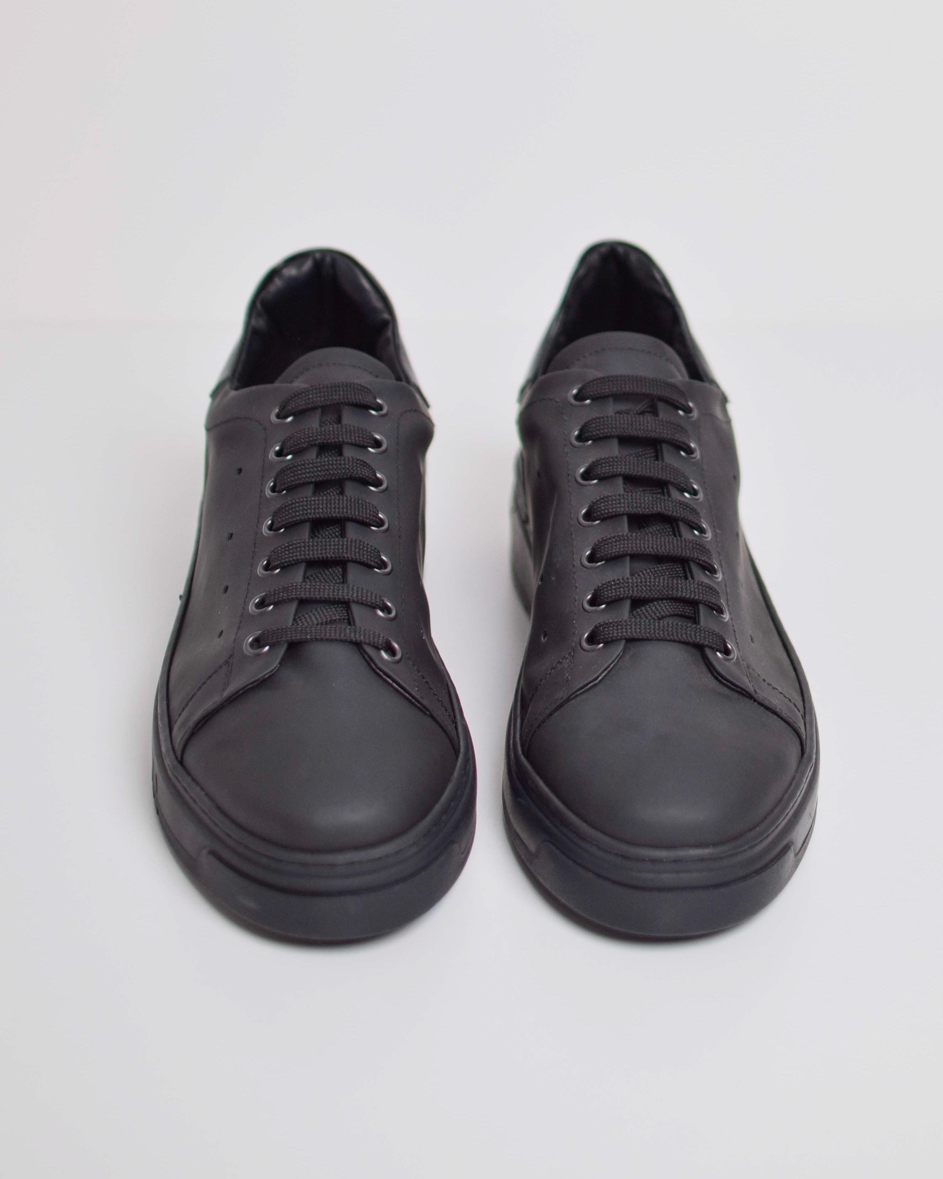 Sneakers in rubberized fabric