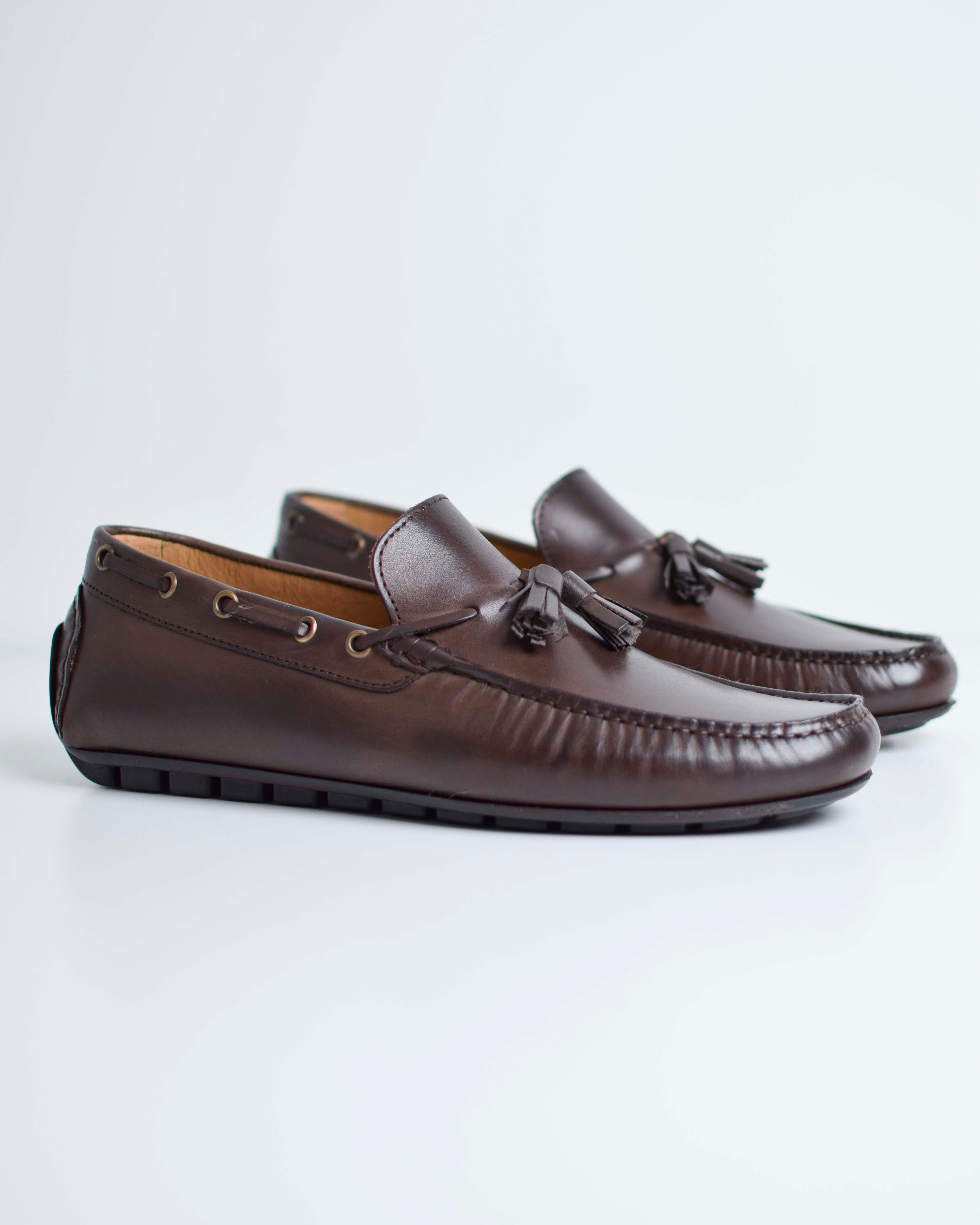 Mocassino con nappine in pelle