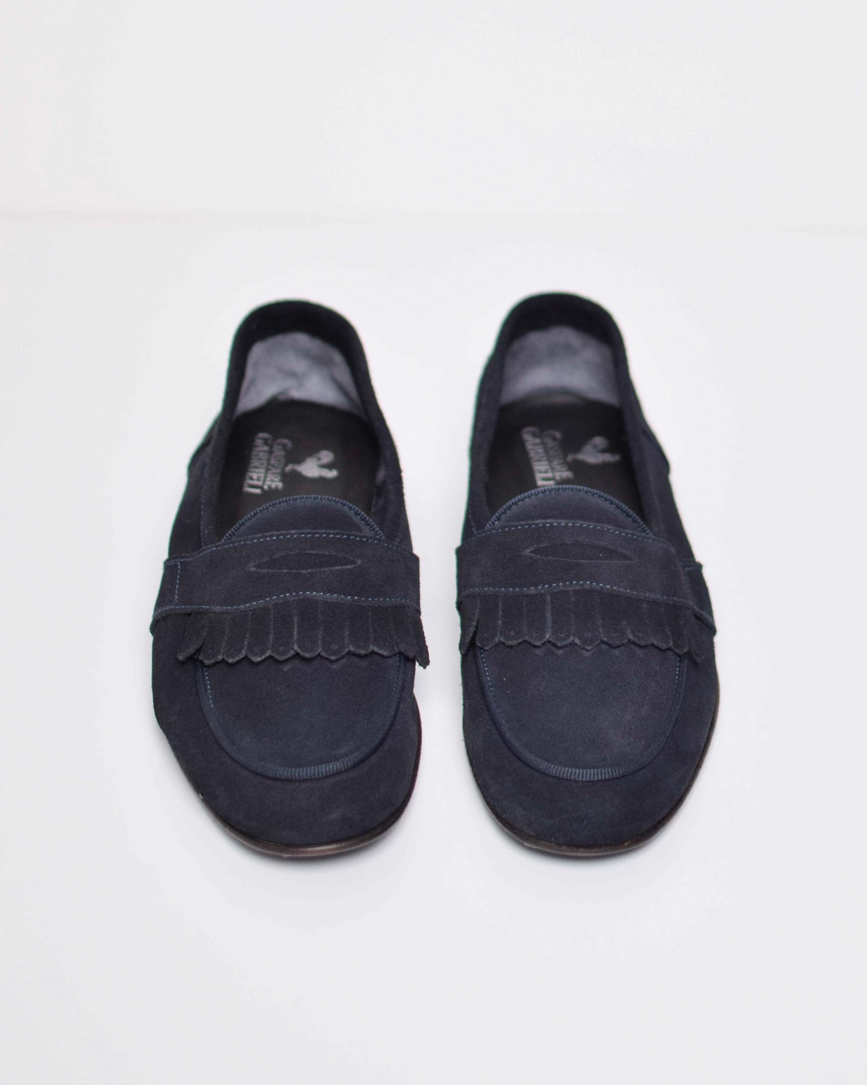 Leather fringe moccasins